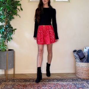 Red faux leather cut out mini skirt